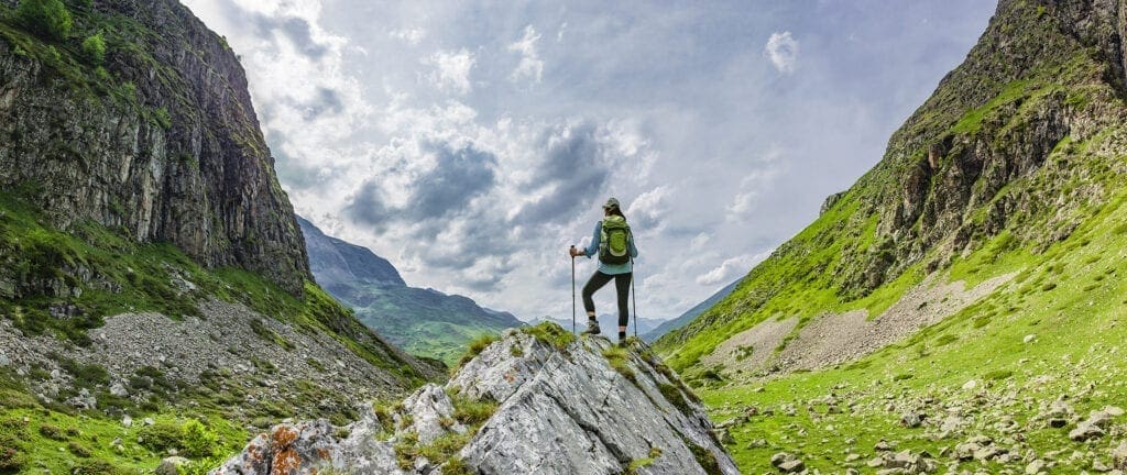 Hiker enjoying the view of mountains