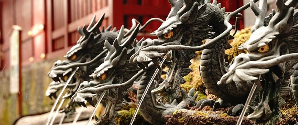 Nine head dragon statue water server at hand washing place of Kuzuryu Jinja Shrine Shingu at Hakone Kanagawa Japan. Chozuya. Temizusha.
