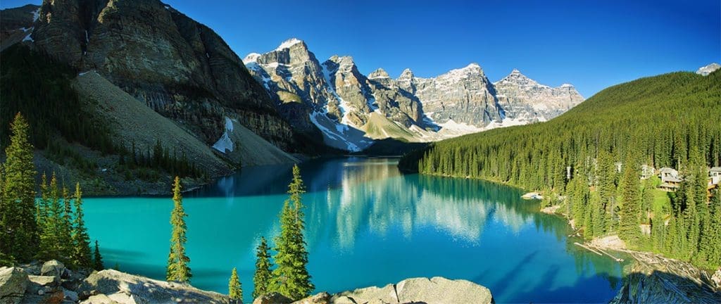 Beautiful scene with mountains and pine trees.