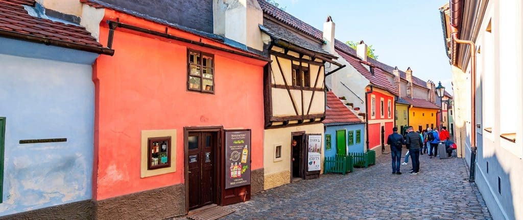 Golden lane colourful houses with tourists in sight