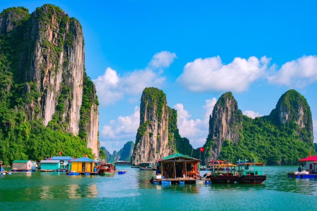 Floating fishing village and rock island in Halong Bay cheapest
